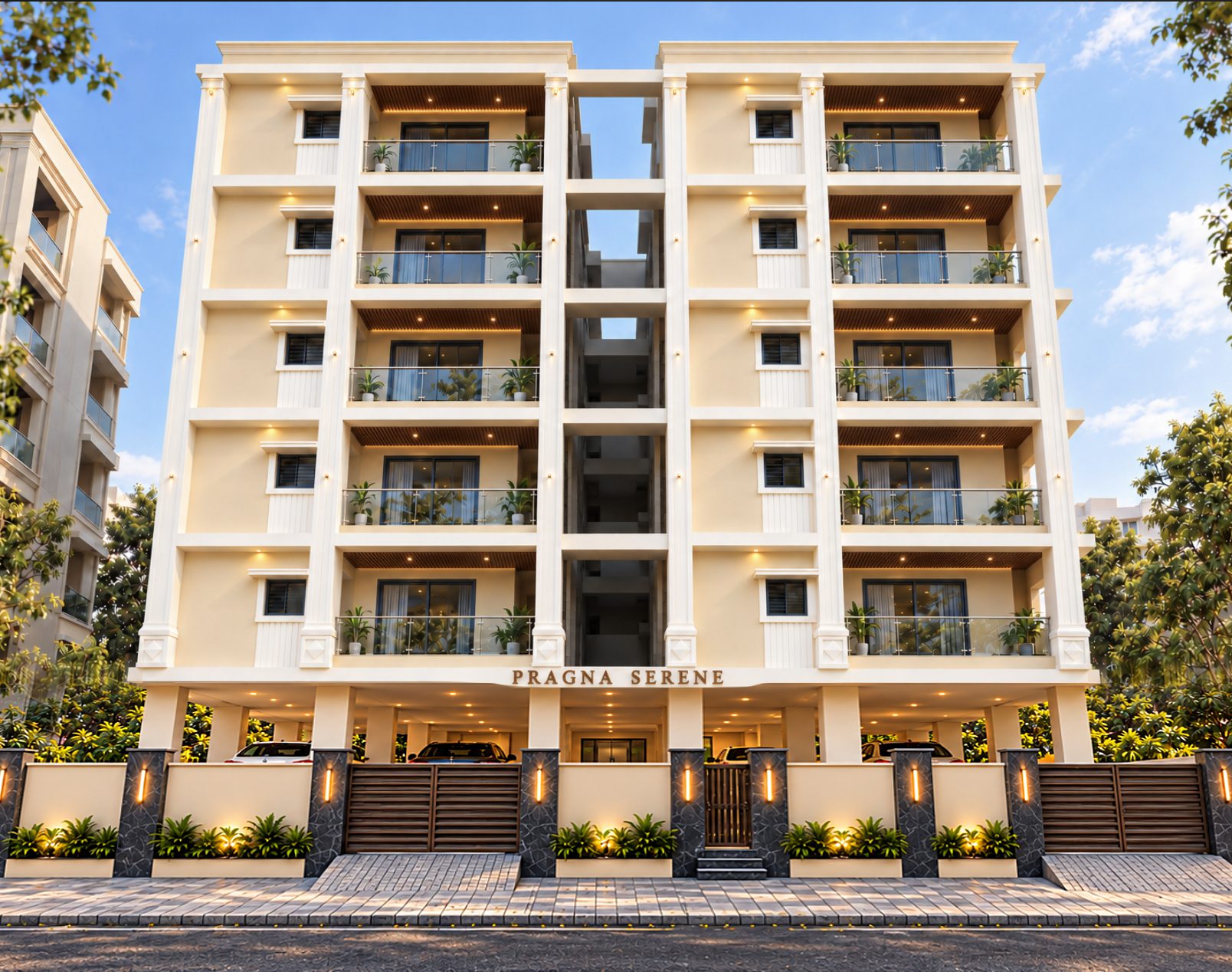 Front view of Pragna Serene: a five-storey ivory building with bronze accents above a stilt parking level, behind a cream compound wall with Black Pearl granite gate piers